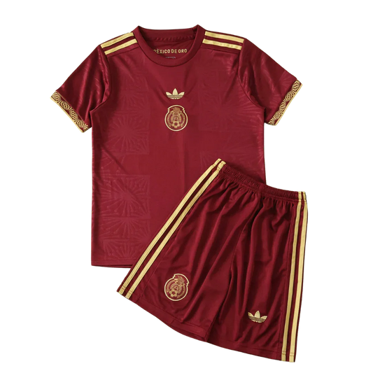 Kit infantil México Conceito 25/26 vinho e dourado. Camisa e shorts com escudo do México, logos Adidas trefoil e listras.