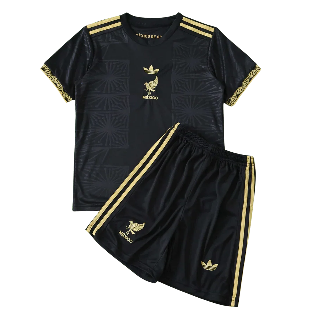 Kit infantil Mexico preto e dourado com camisa e shorts. Inclui emblemas do México e logo Adidas em dourado.