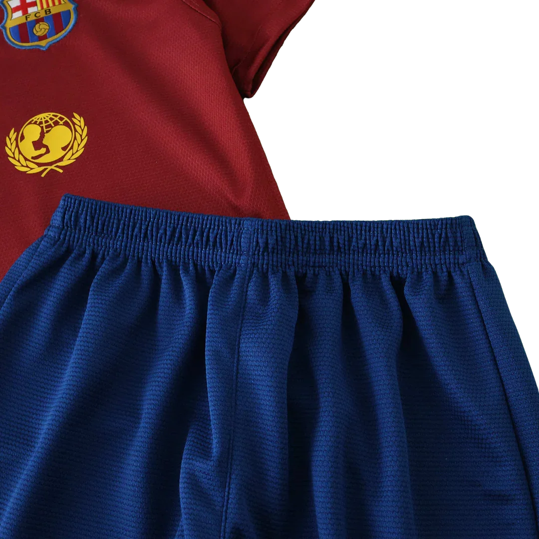 Kit oficial infantil FC Barcelona Mini Mantos: camisa grená e shorts azul