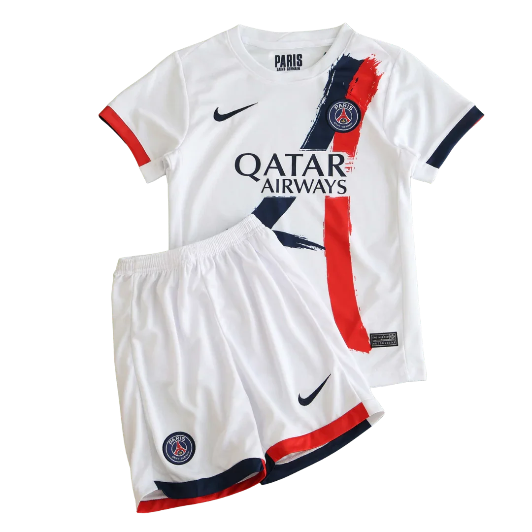 Kit infantil oficial Mini Mantos do Paris Saint-Germain. Camisa e shorts PSG brancos com detalhes vermelhos e azuis