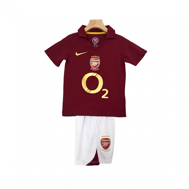 Camisa infantil retrô do Arsenal I 05/06. Estilo e nostalgia para os fãs. Compre agora!