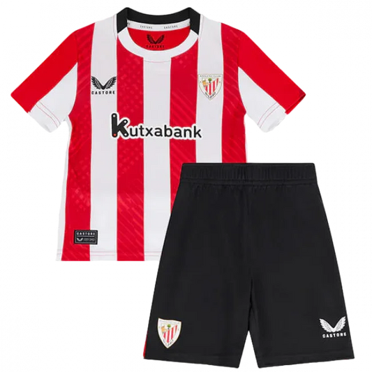Kit infantil Athletic Bilbão 24/25 com camisa listrada vermelha e branca, shorts pretos, escudos do time e logos Castore.