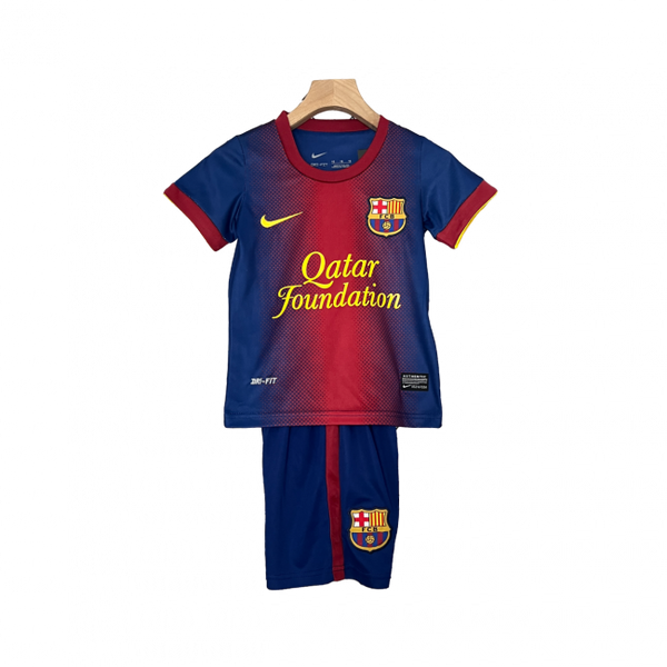 Camisa infantil retrô do Barcelona I 12/13. Reviva os momentos clássicos. Compre já!