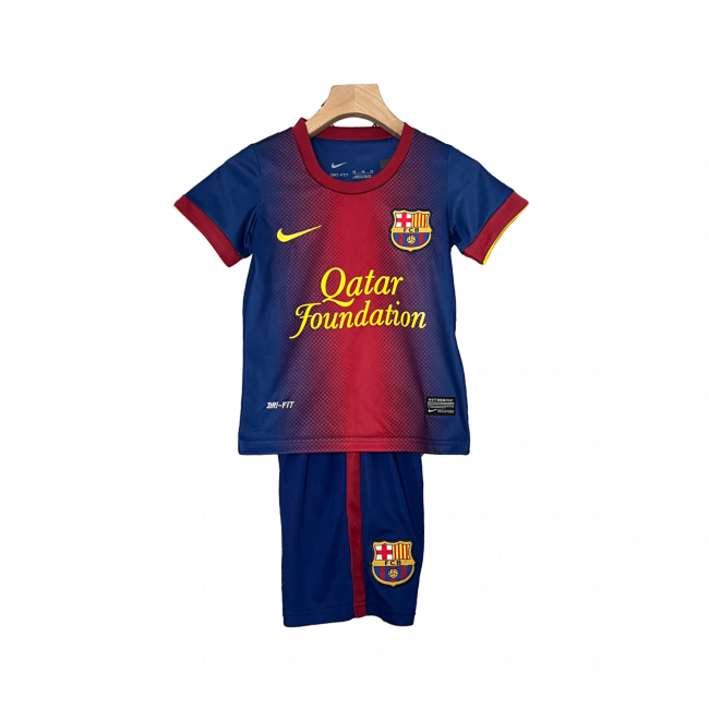 Camisa infantil retrô do Barcelona I 12/13. Reviva os momentos clássicos. Compre já!