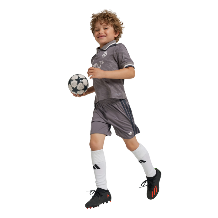 Camisa infantil do Real Madrid III 24/25. Perfeita para os fãs do clube. Garanta a sua!