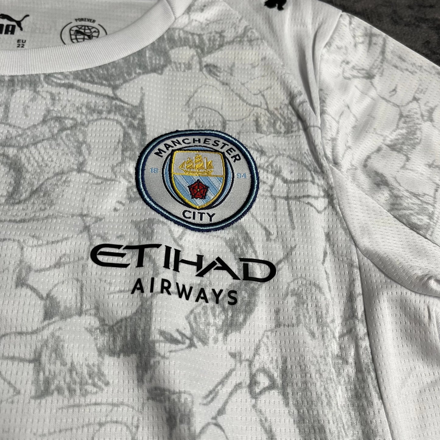 Camisa oficial Mini Mantos kit infantil Manchester City branca, Etihad Airways, para pequenos torcedores