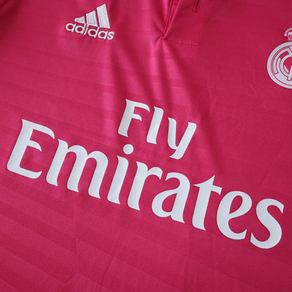 Camisa oficial infantil Real Madrid rosa, kit Mini Mantos. Detalhes bordados Adidas e patrocinador Fly Emirates