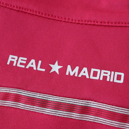 Camisa oficial Real Madrid infantil rosa, estampa "REAL ★ MADRID" branca, detalhe listrado, kit Mini Mantos