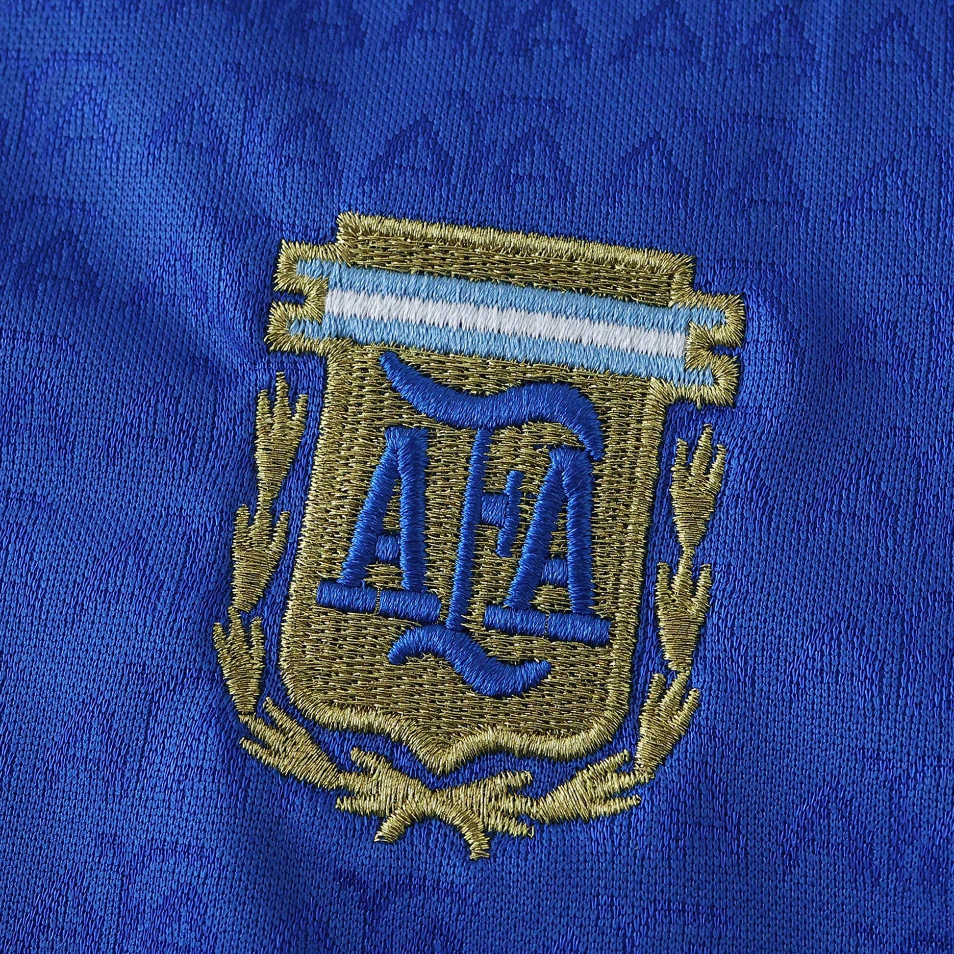 Camisa oficial infantil Argentina Mini Mantos, kit completo com escudo AFA bordado em azul