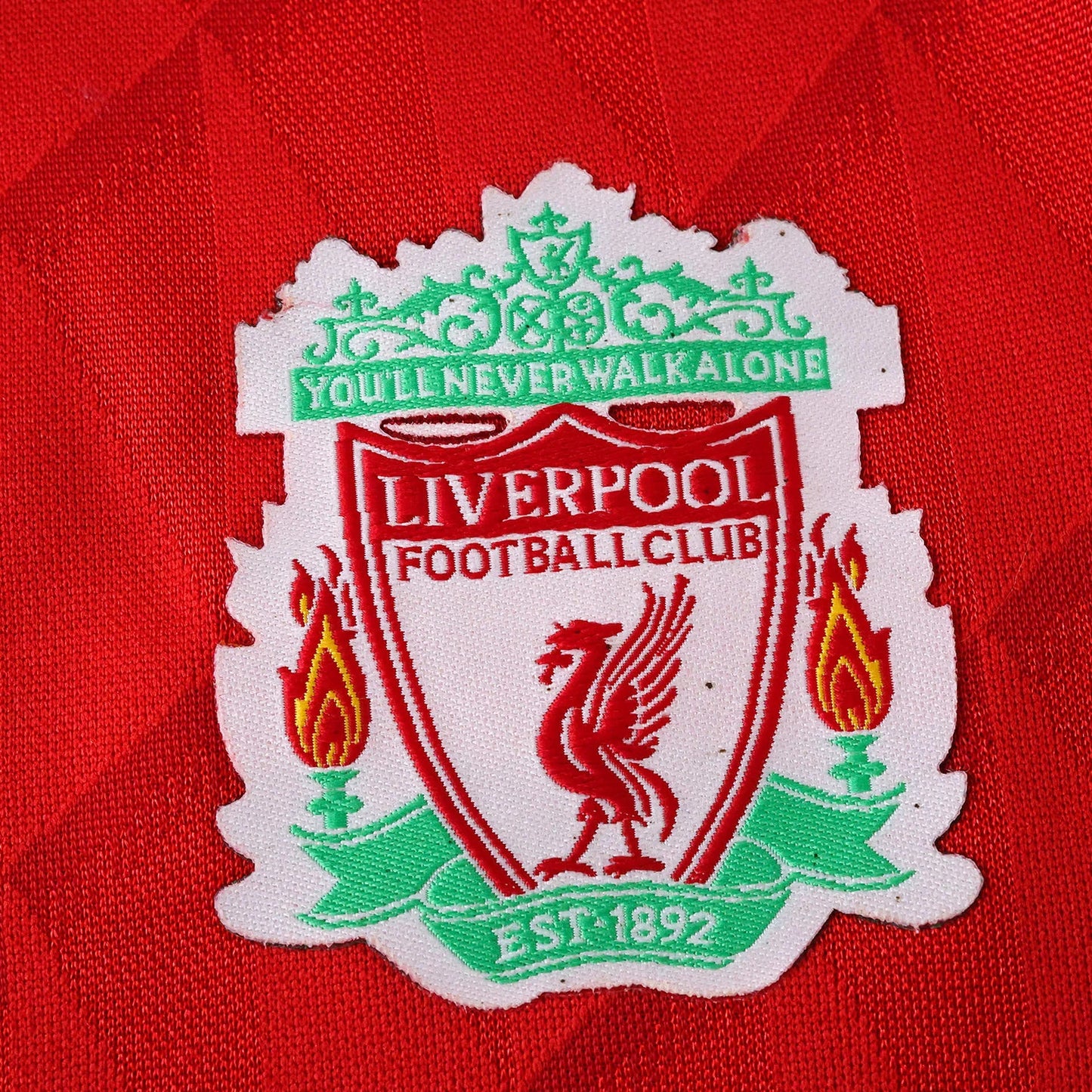 Camisa oficial infantil Liverpool FC, kit Mini Mantos com brasão e “You’ll Never Walk Alone” bordado