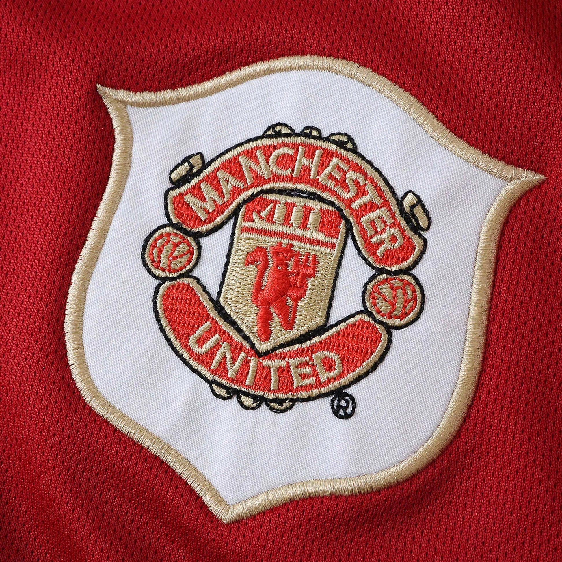 Escudo bordado da camisa Manchester United oficial infantil Mini Mantos, parte do kit de futebol