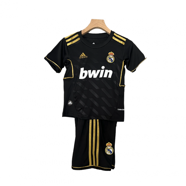 Camisa infantil retrô do Real Madrid I 11/12. Reviva os momentos clássicos. Compre já!